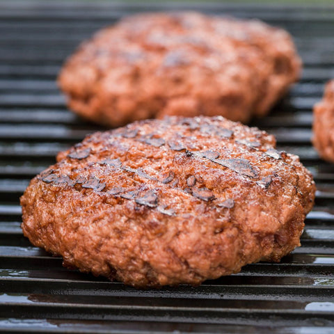 Suovasburgare av renkött på grill